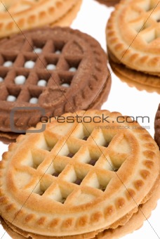 Cookies. A sweet, bakery product. Brown and white