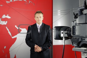television news reporter and video camera