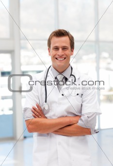 Male Doctor with Folded arms looking at camera
