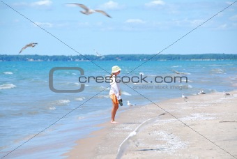 Girl beach seagulls