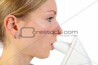 young female using an inhalator