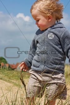 close up of boy in dunes