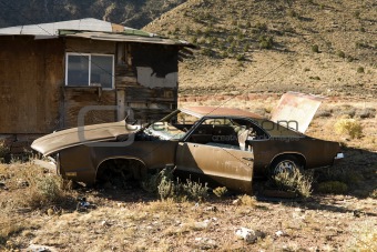 Abandoned Junk Car in Desert