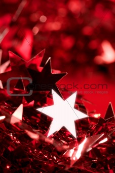 Christmas star decoration still on red background
