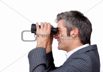 Smiling Attractive businessman looking through binoculars isolated on a white background