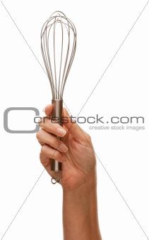Woman Holding Egg Beater in the Air Isolated on a White Background.