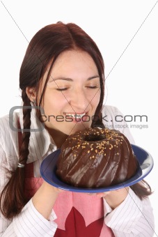 housewife smelling bundt cake