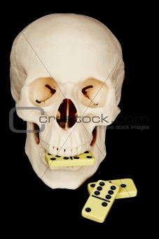 Skull eating dominoes
