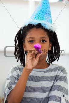 Portrait of a little boy at a birthday party 