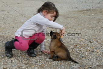little girl and puppy