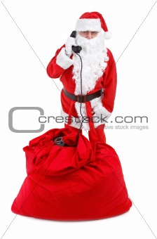 Santa claus receives a phone call