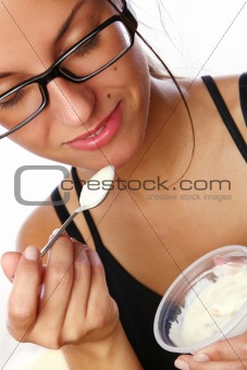 beautiful woman eating dessert jogur