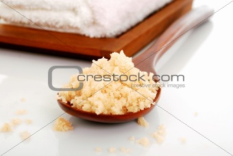 bath salt on a wooden spoon closeup 