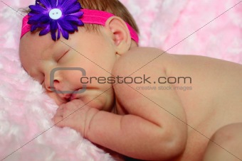 Sleeping newborn girl