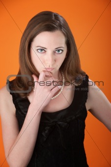 Cute Girl with Fingers on Chin