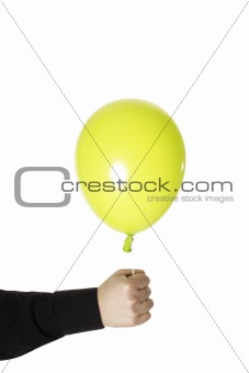 man holding yellow baloonn isolated