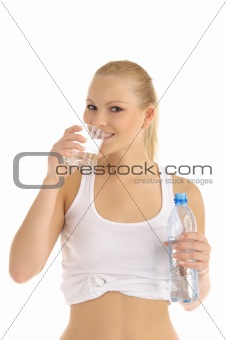 happy woman drinks water from a glass