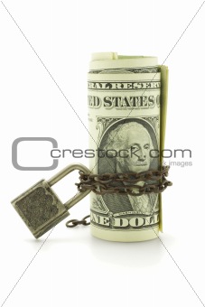 US dollars under chain and lock