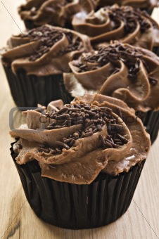 Lovely fresh chocolate cupcakes - very shallow depth of field