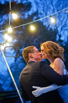 Newlyweds. Romantic Honeymoon dance with lanterns