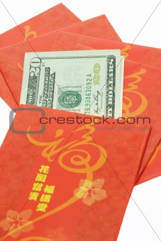 Chinese New year red packets and US dollars
