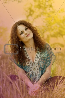 Redhead girl at green grass. Photo at multicolor style.