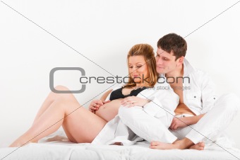 man and his pregnant wife