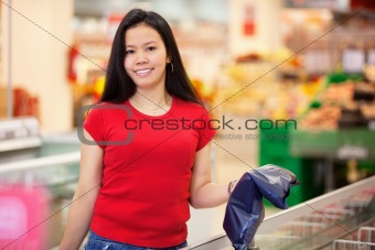 Portrait of smiling woman in store