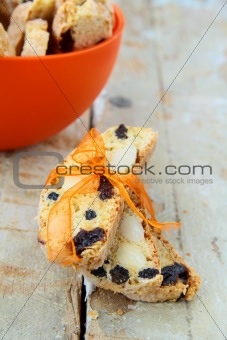 Italian biscotti cookies with a ribbon on a wooden table