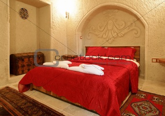 alcove archway bedroom layout red bedspread