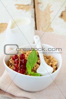 bowl of cornflakes with milk and  berries, healthy breakfast