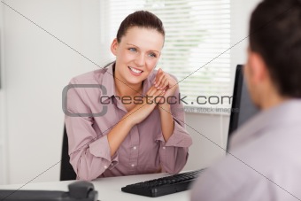 Businesswoman talking with customer