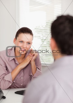 Businesswoman talking with a man