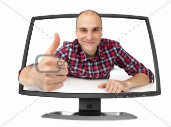happy young man in the computer monitor