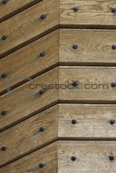 wooden background with iron rivets