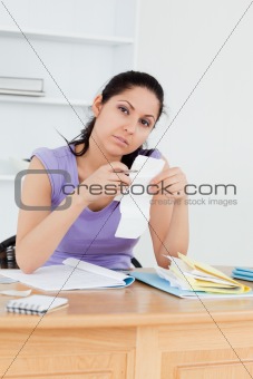 Bored looking woman accounting
