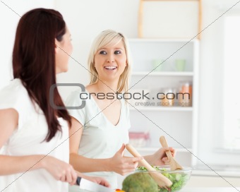 Cheering Women preparing dinner