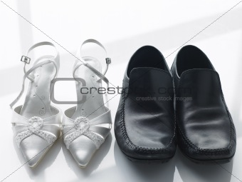 Bride And Groom's Shoes Side By Side