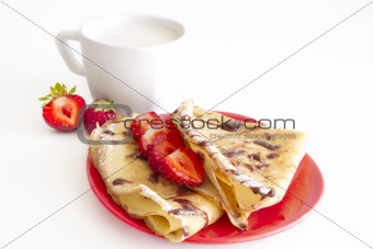 pancakes with strawberry and cup of milk