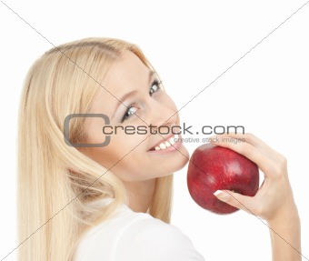 Beautiful woman biting a red apple