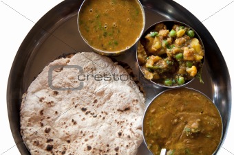 Traditional Indian cuisine vegetarian thali served in small bowl