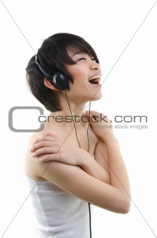 Music. Woman dancing with earbuds 