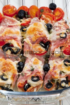 baked ham rolls filled with chicken meat and black olives