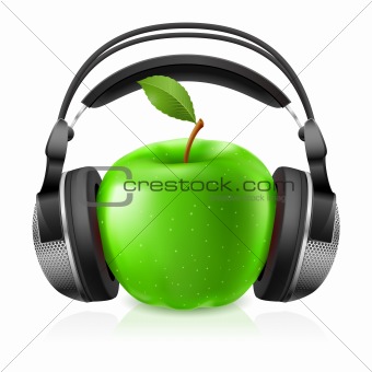 Realistic headphones and green apple