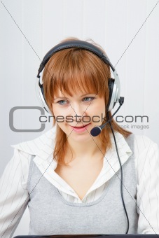 girl in headphones with a microphone