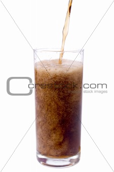 Pouring cola in to the glass