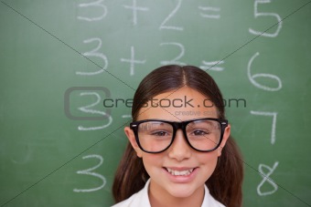 Smart schoolgirl posing