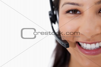 Smiling female call center agent with headset