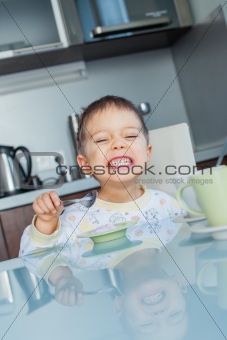 Happy Boy Eating Breakfast