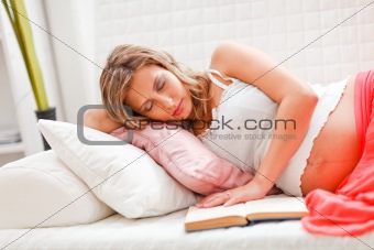Pregnant woman fell asleep while reading book